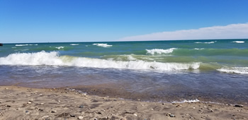 Hiking along shore of Lake Michigan at Illinois Beach State Park